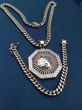 14k gold plated 8mm Cuban link chain and bracelet set with a nice World pendant
